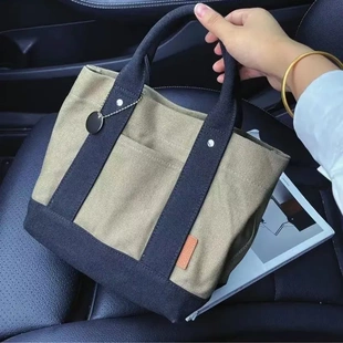 日本妈咪包母婴外出小轻便手拎高档帆布斜挎多隔层托特便当包日本