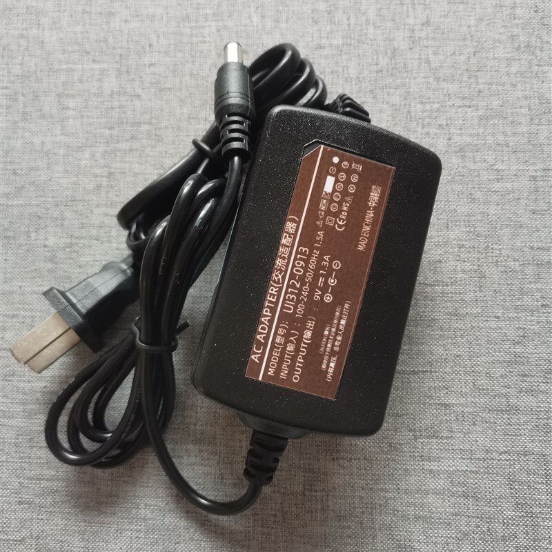 通用  UI312-0n913 电源适配器 DC9v1.3a 2A 内负外正