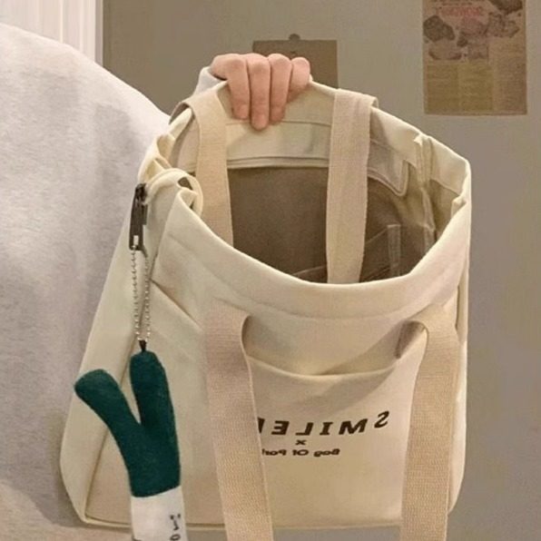 大学生上课帆布包女2026新款休闲百搭单肩包大容量上班通勤托特包