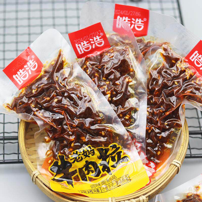 新日期老妈牛肉粒辣条碳烤素粒麻辣香辣素食儿时怀旧小吃零食