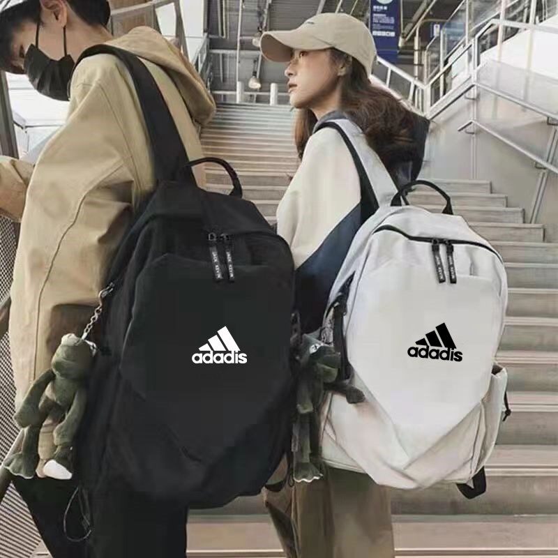 2024新款双肩包男士户外旅行电脑背包初高中大容量学生书包女帆布