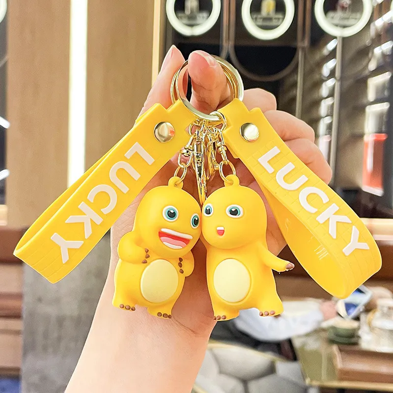 网红爆款呆萌奶龙公仔钥匙扣挂饰可爱汽车钥匙链书包挂件礼品