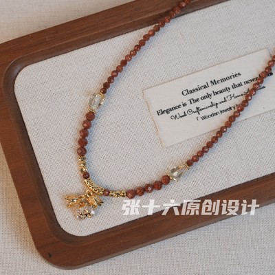 张十六铃兰铜合金新年红毛衣链