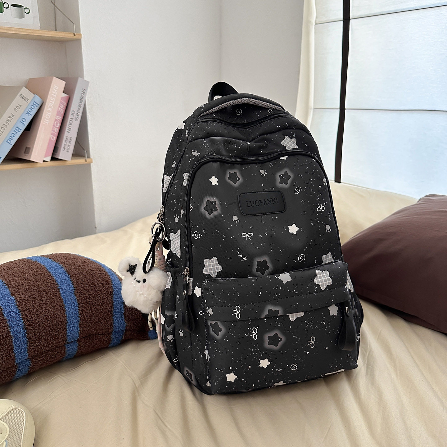 校园书包新款可爱星星学生背包女双肩旅游轻便小学生初中生高中生