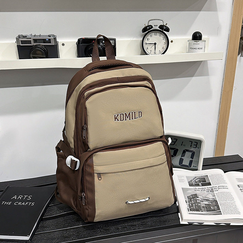 潮牌男时尚休闲高中小众大容量通勤耐脏女户外出行旅游书包双肩包