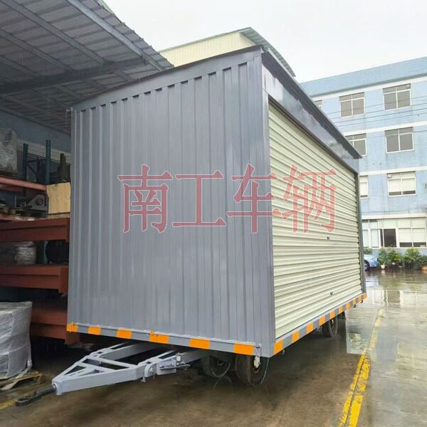 南工10吨箱式平板拖车两侧带卷帘门 牵引雨篷拖车