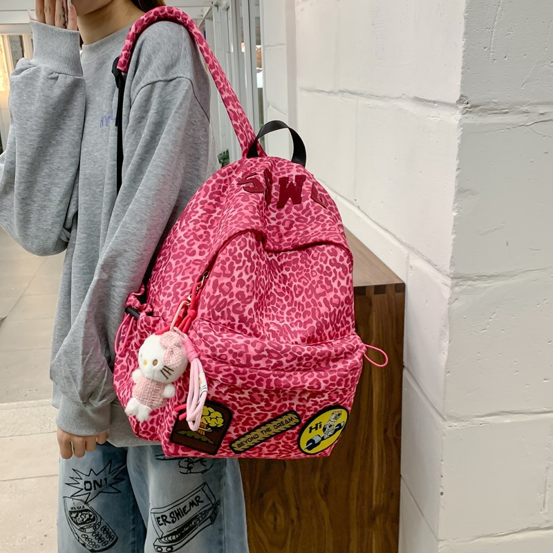 新品潮流豹纹双肩包大容量韩版女初中高中生小众休闲学生背包