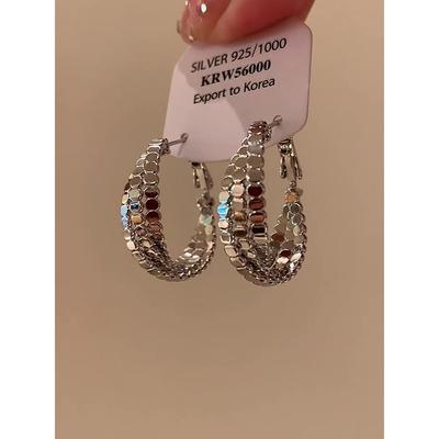 波光粼粼银色扭曲麻花耳环设计感