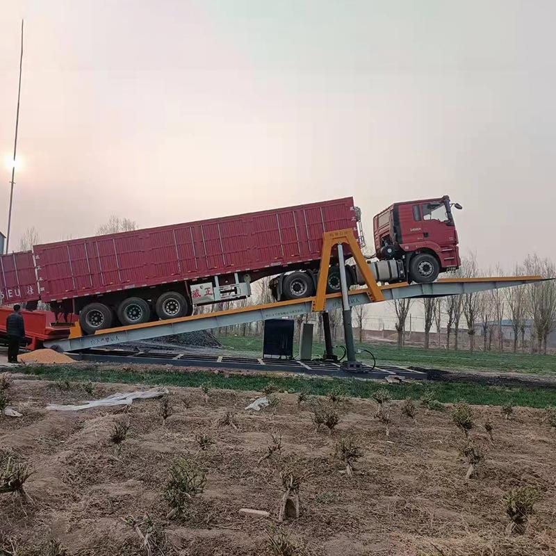 液压翻板机液压卸车翻板机自动升降卸车平台大型粮仓自动卸车机