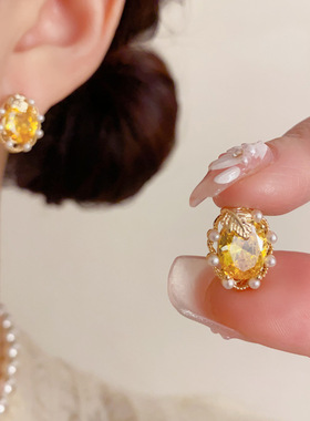 小众时尚简约树叶珍珠椭圆耳钉女精致轻奢百搭高级感超闪耳环批发