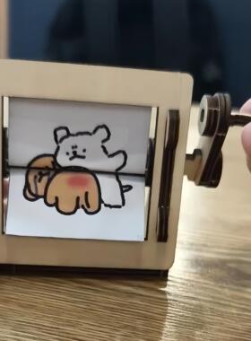 小红书同款线条小狗转动打屁股摇摇乐创意解压小玩具桌面装饰摆件