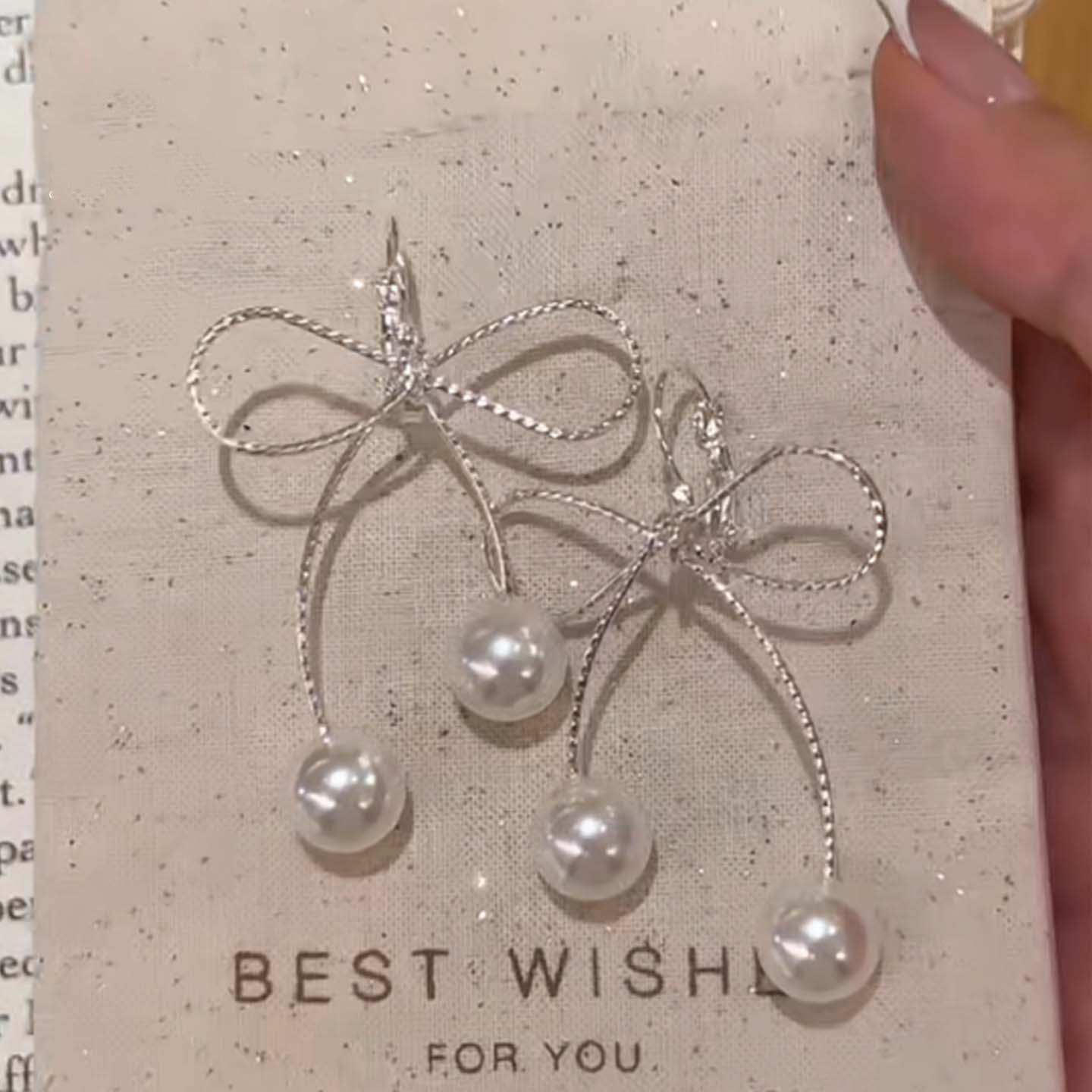 银色镂空蝴蝶结流苏耳扣女