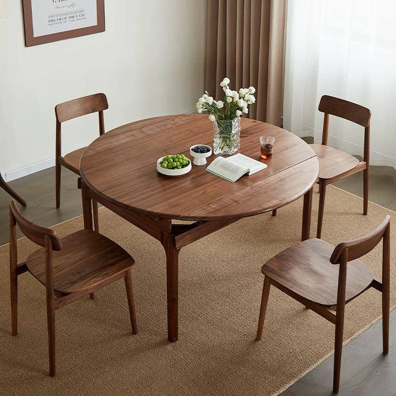 新中式北美黑胡桃木餐桌椅组合现代简约实木圆桌家用可伸缩多功能