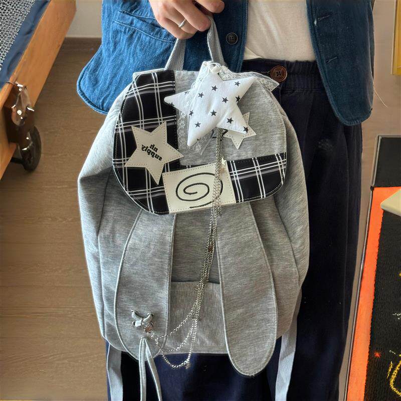 兔子耳朵双肩包日常高级感通勤背包初中生上课大容量翻盖束口书包