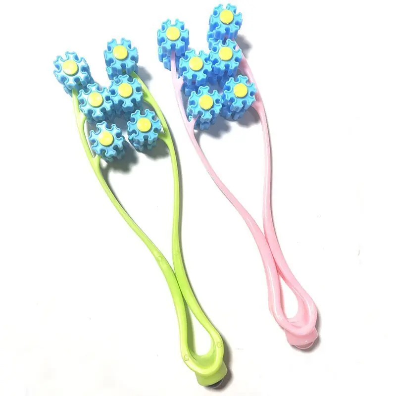 源头工厂新款小型脸部滚轮按摩器亲肤按摩仪面部按摩器滚珠夹脸器