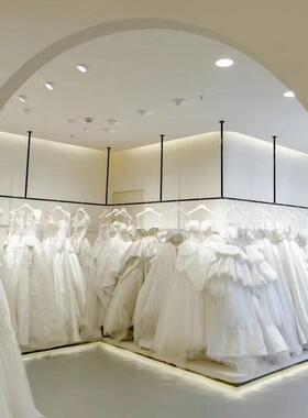 黑色婚纱架子 婚纱吊架 礼服挂衣杆吊顶悬挂货架上墙异形弧形订制