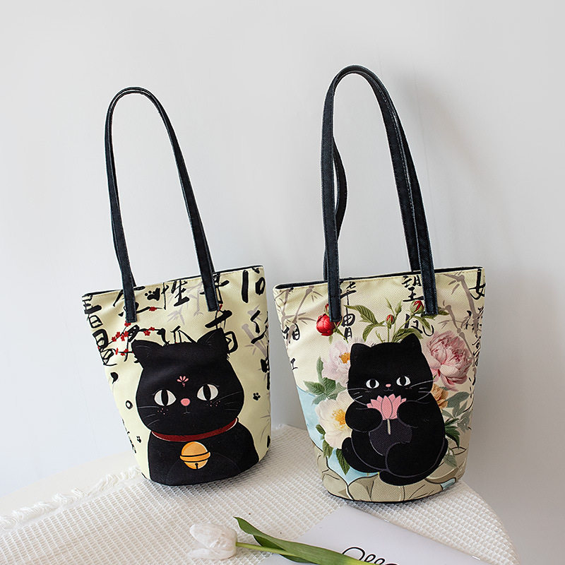 原创新款单肩包女包中国风文艺水桶包女外出大容量时尚小众单肩包