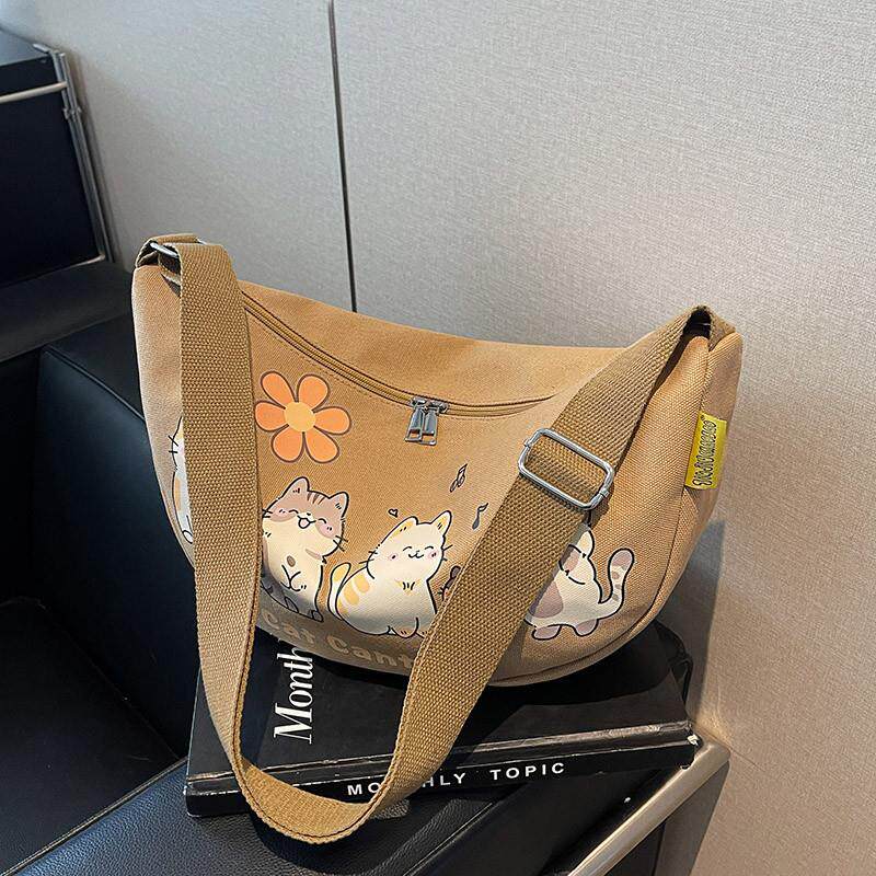 新品休闲斜挎饺子包女2025新款潮韩版单肩大容量上课通勤包百搭帆