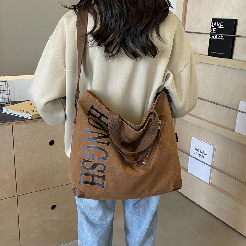 推荐帆布大包包日系女2025