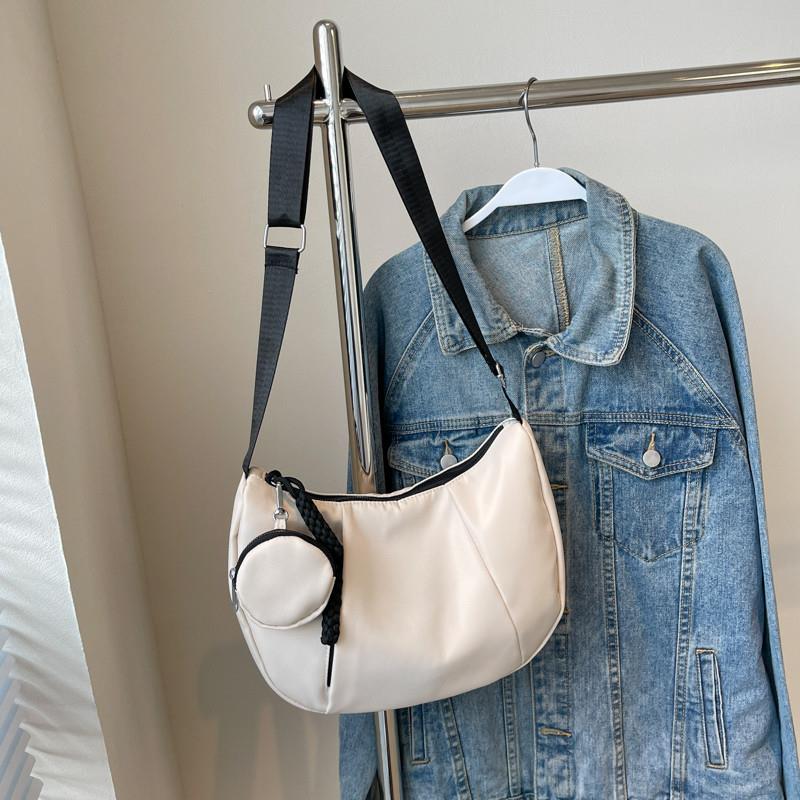 推荐时尚小帆布包包女2025