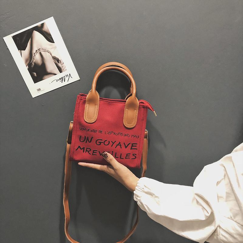 推荐慵懒风帆布包包女2025