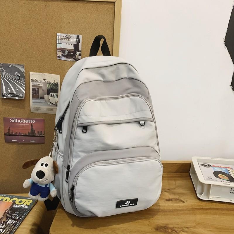 新品ins学院风韩版双肩包男初中高中大学生上课大容量书包休闲背