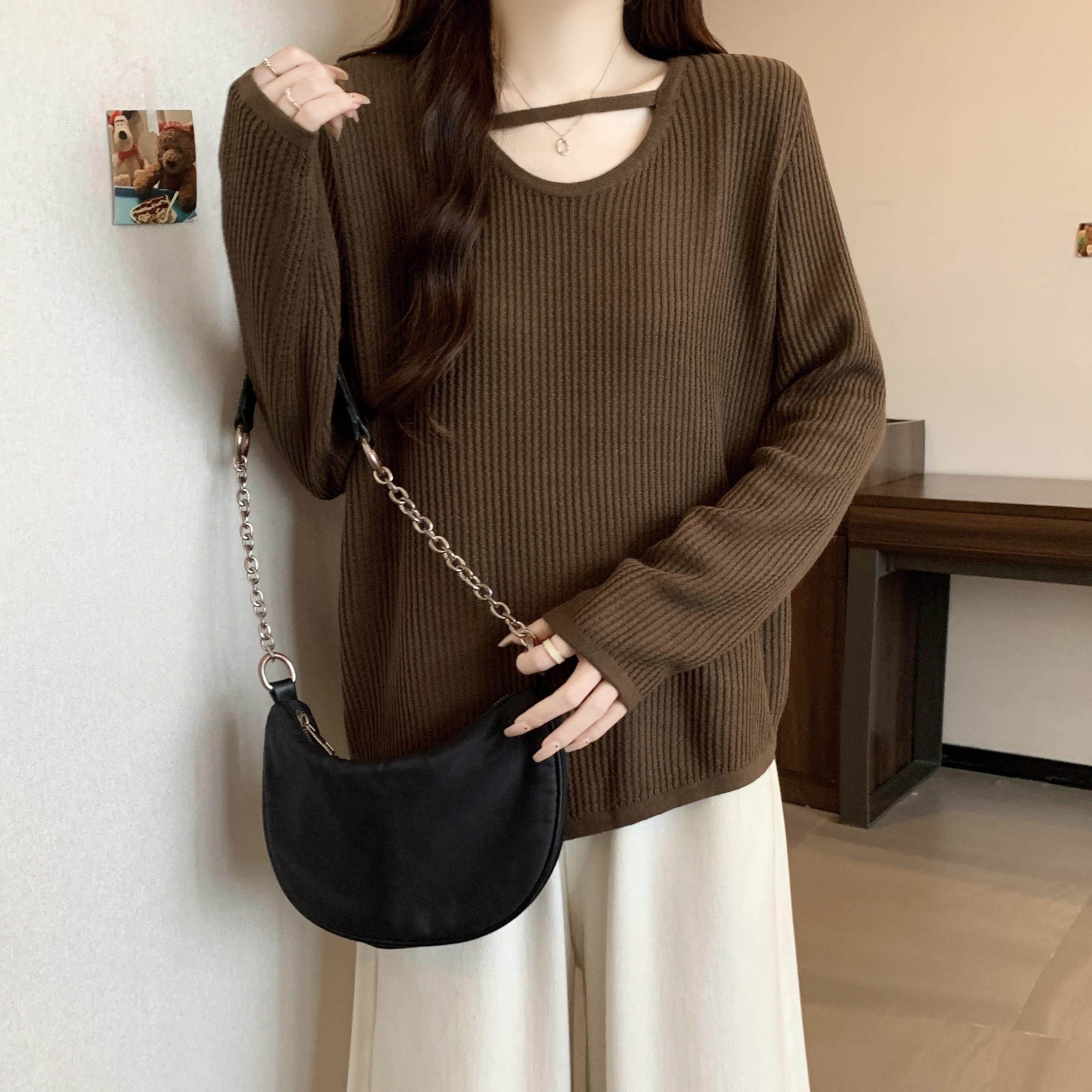 新品不规则镂空长袖针织衫