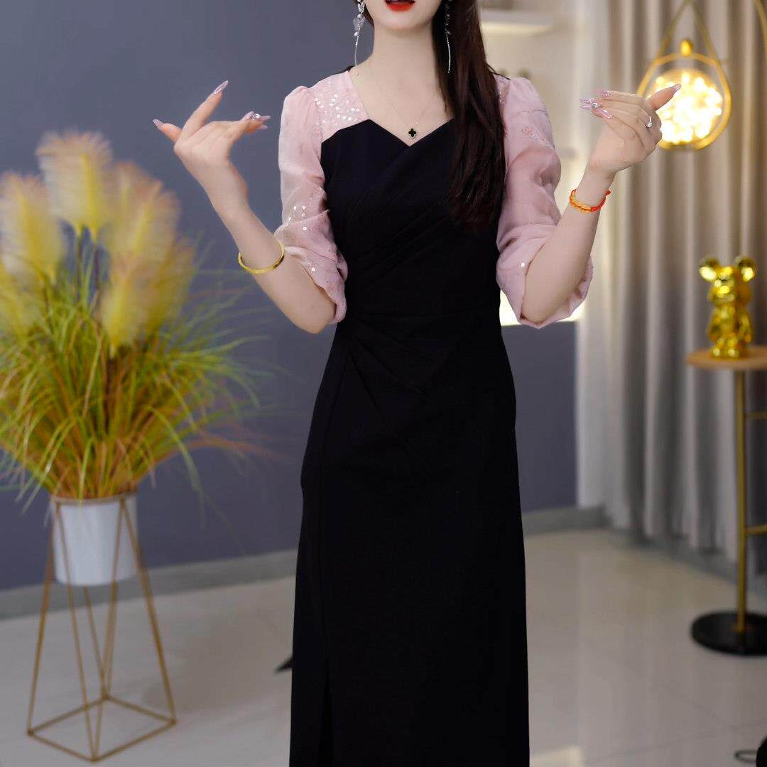 好货黑色拼接连衣裙女2026秋季新款妈妈装修身显瘦遮肉减龄中长款
