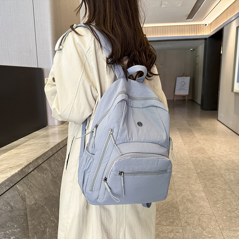 简约纯色大双肩包女大容量轻便旅行通勤背包大学生书包户外多口袋