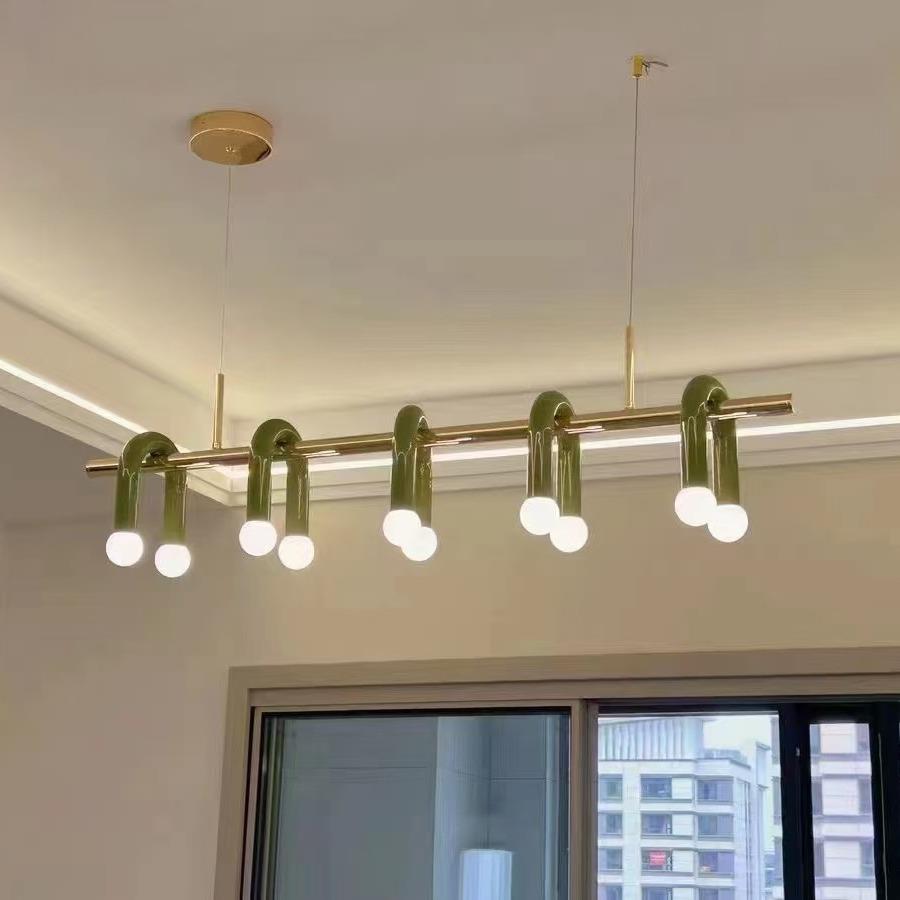 北欧奶油风客厅吊灯简约设计师2024新款创意U型餐桌吧台中山灯具