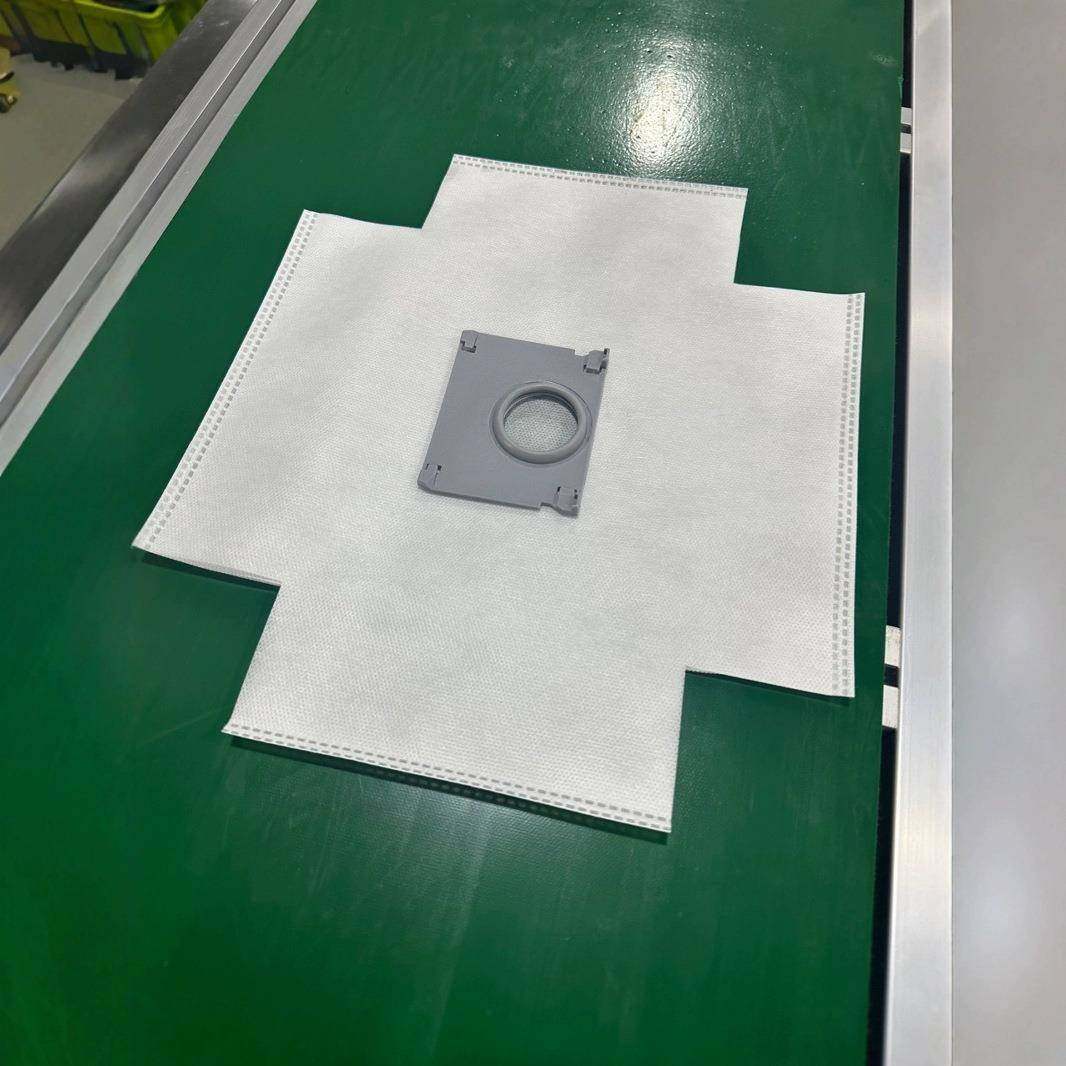 扫地机器人集尘袋机器，集尘袋生产线，立体袋机器，吸尘器集尘袋,纺织面料/辅料/配套,其他纺织机械,淘宝优惠券,粉丝福利购,淘宝优惠卷