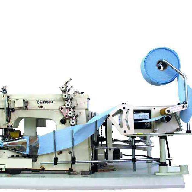 牌STFS侧送型送料机，用于绷缝机