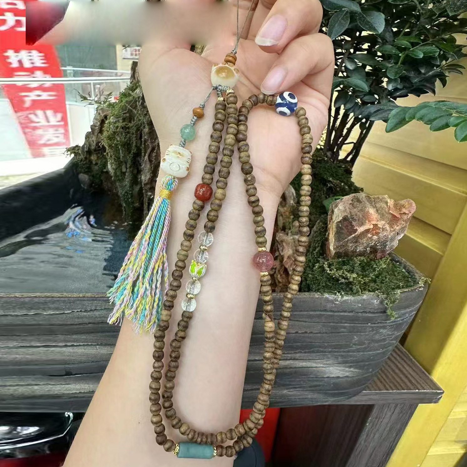 直销直播货源一线黄油沉香木手工编织手机链木制文玩挂饰女款挂脖