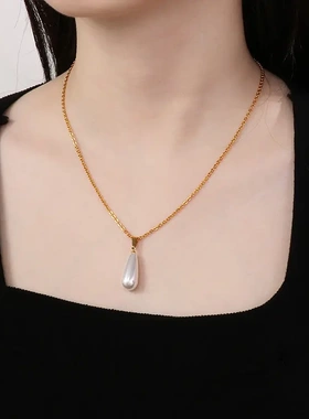 速卖通饰品货源 时尚个性白色珍珠挂件简约珠子钛钢吊坠女