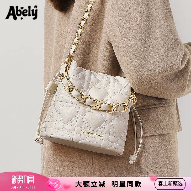 Abely阿贝莉新款女包菱格链条斜挎包白色水桶包真皮高级感单肩包