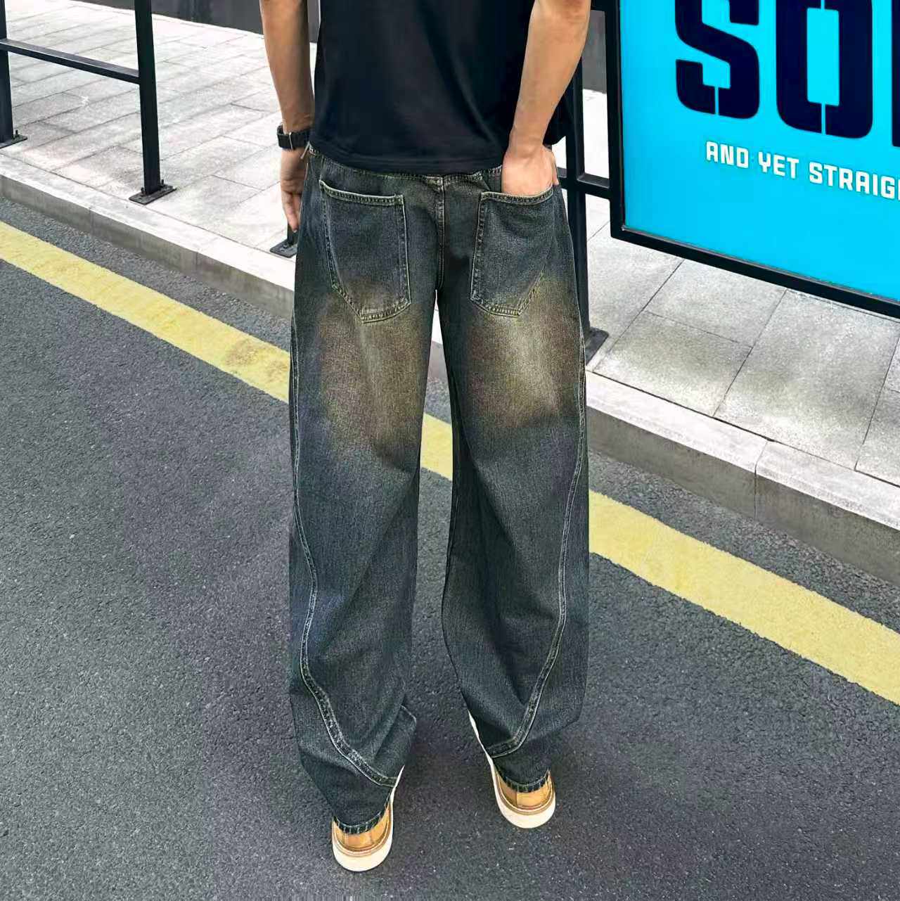 QUALCOMM做旧拼接弯刀牛仔裤