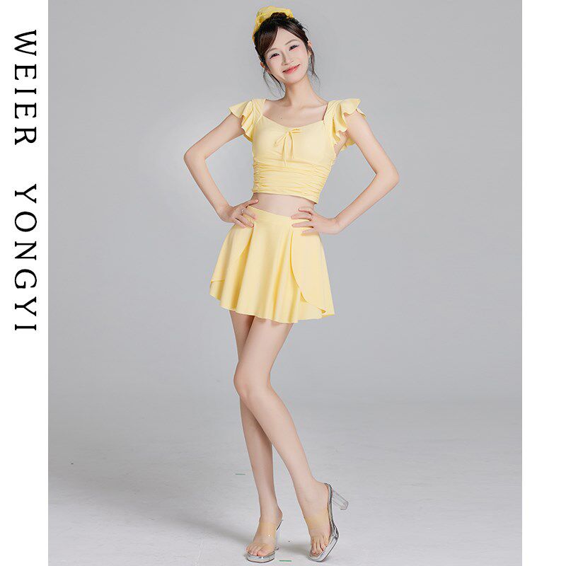 泳衣女高级感2025新款奶黄色分体裙式显瘦海边度假小胸聚拢泡温泉