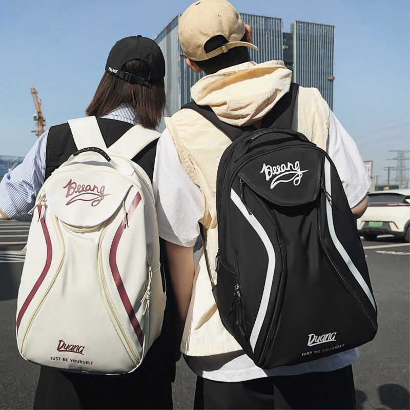 大容量运动训练羽毛球包网球双肩背包男款大学生旅行通勤包书包女