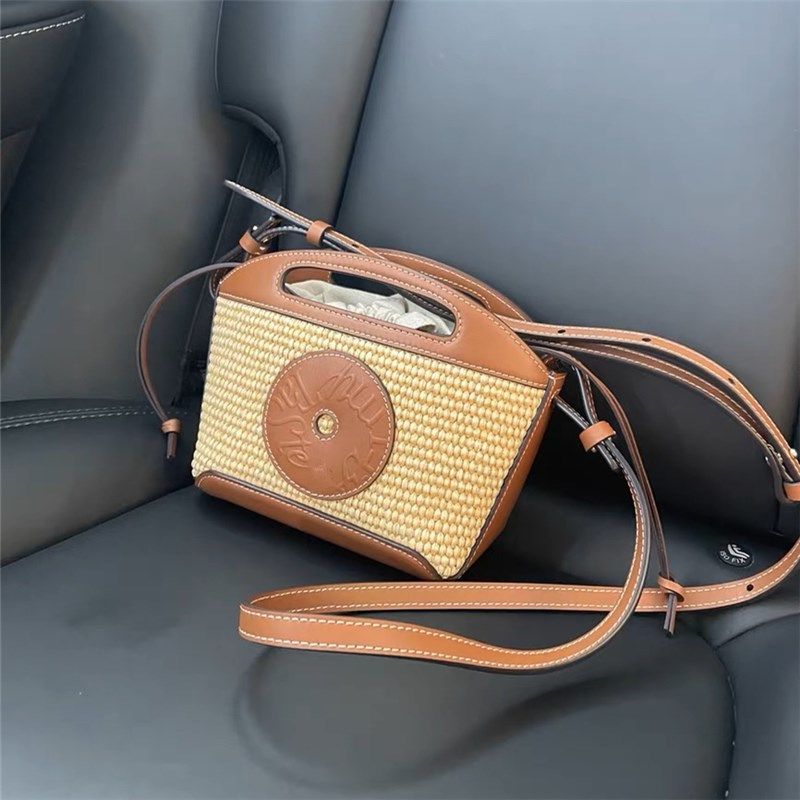 包包女2024新款夏曲奇抽绳菜篮子包单肩斜跨草编包小众手提水桶包