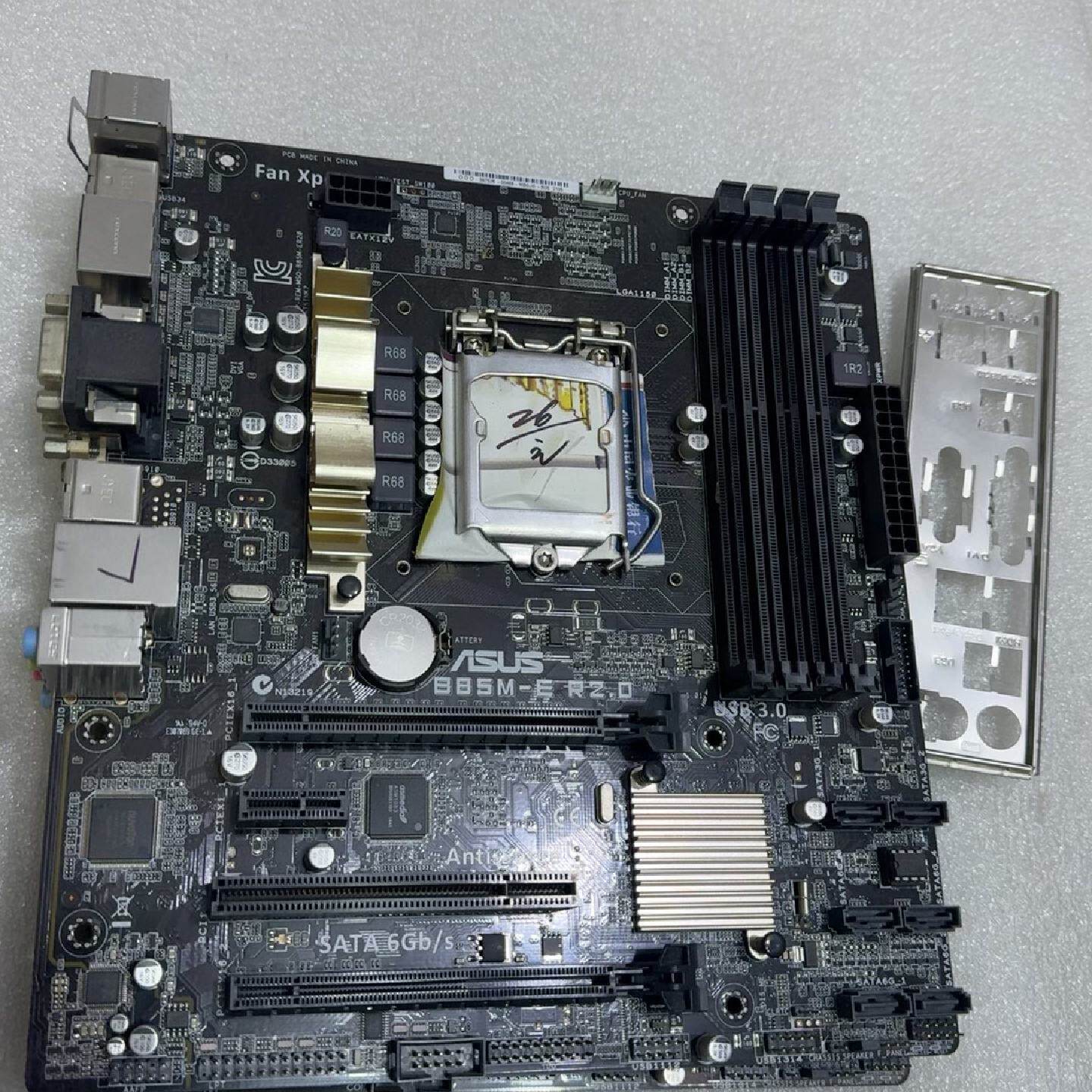 出2片，华硕B85M-E R2.0主板，成色如图，功能正常使--议价商品