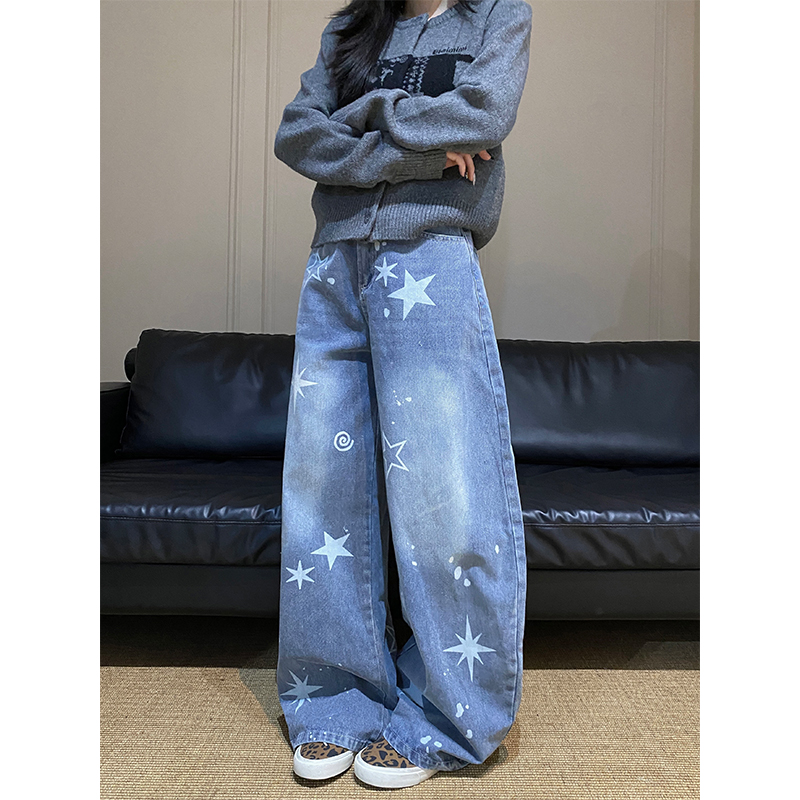 水洗做旧星星印花弯刀牛仔裤