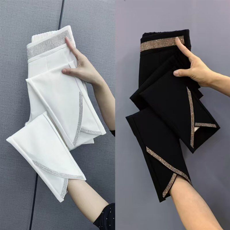 南韩四面弹力小西裤女重工烫钻松紧腰时装裤裤脚开叉设计九分裤潮