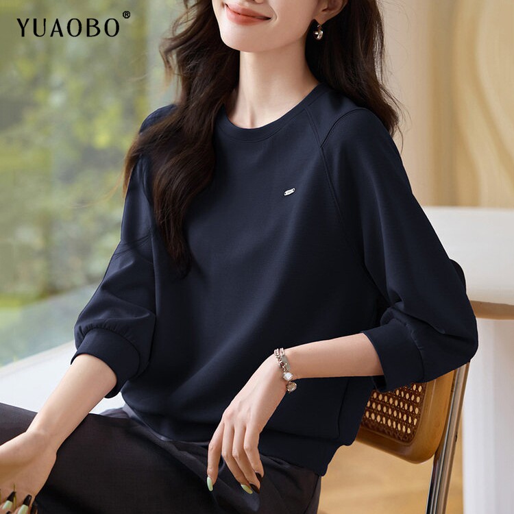 休闲洋气百搭上衣女2026秋季新款简约风宽松圆领深蓝色插肩袖卫衣