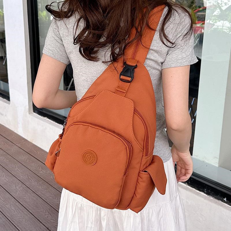 宇帝用品多功能时尚背包新款休闲双肩胸包定制特染防水牛津布女包
