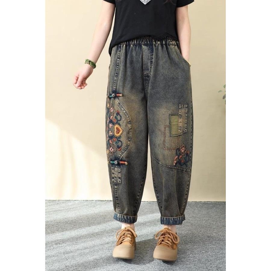文艺复古彩色盘扣刺绣2025年春季牛仔裤女宽松大码绣花九分哈伦裤