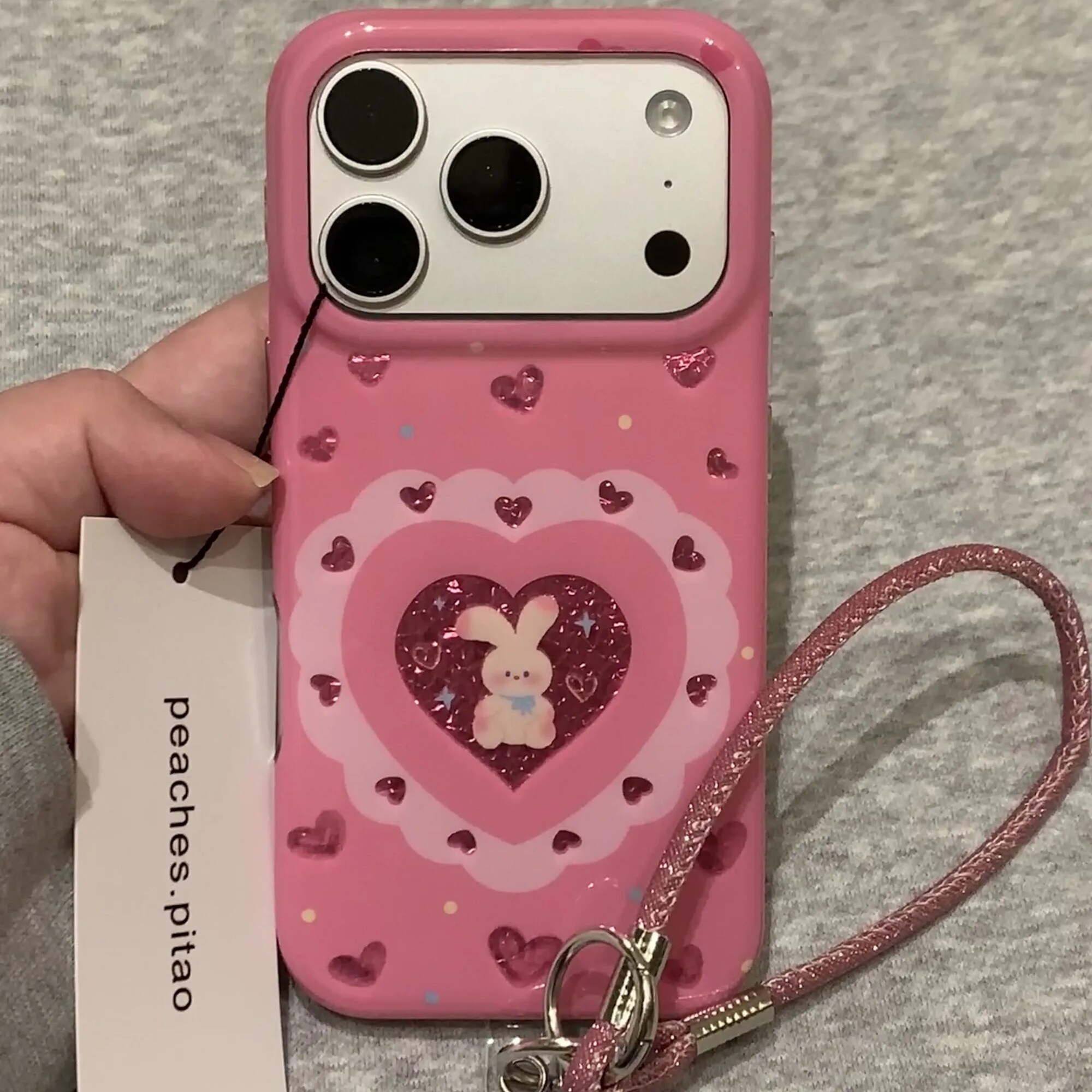 雨柠可爱卡通玫粉色爱心小兔子挂绳适用于iPhone17promax新款苹果16手机壳15个性创意日韩14防摔保护套