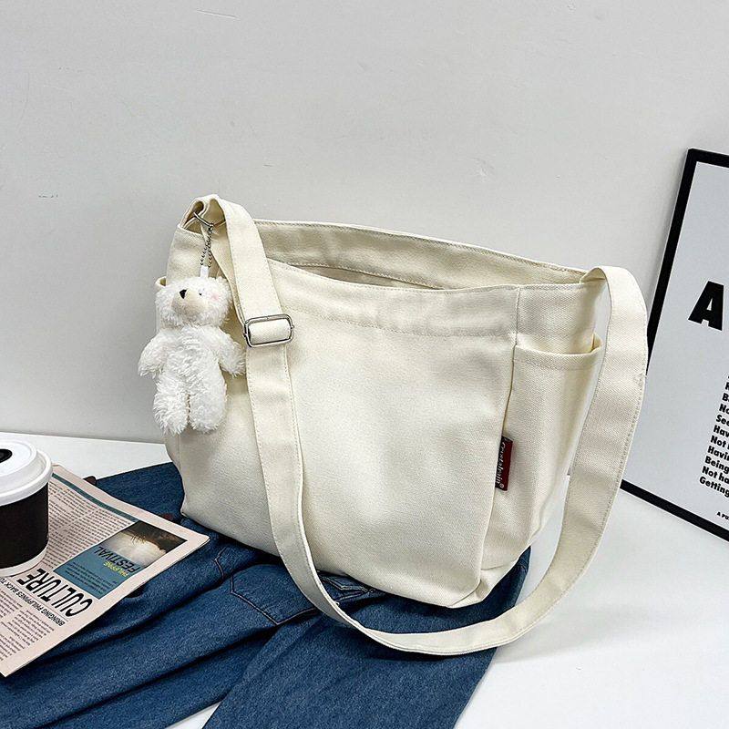 月光刻本单肩包日系2025新款简约帆布斜挎包ins风休闲百搭斜挎包,箱包皮具/热销女包/男包,通用款女包,淘宝优惠券,粉丝福利购,淘宝优惠卷