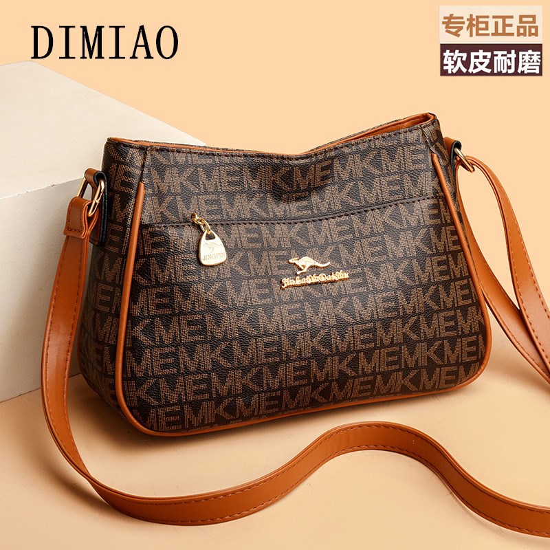 真皮包包女款大容量印花单肩斜挎包2025新款中老年妈妈软皮水桶包