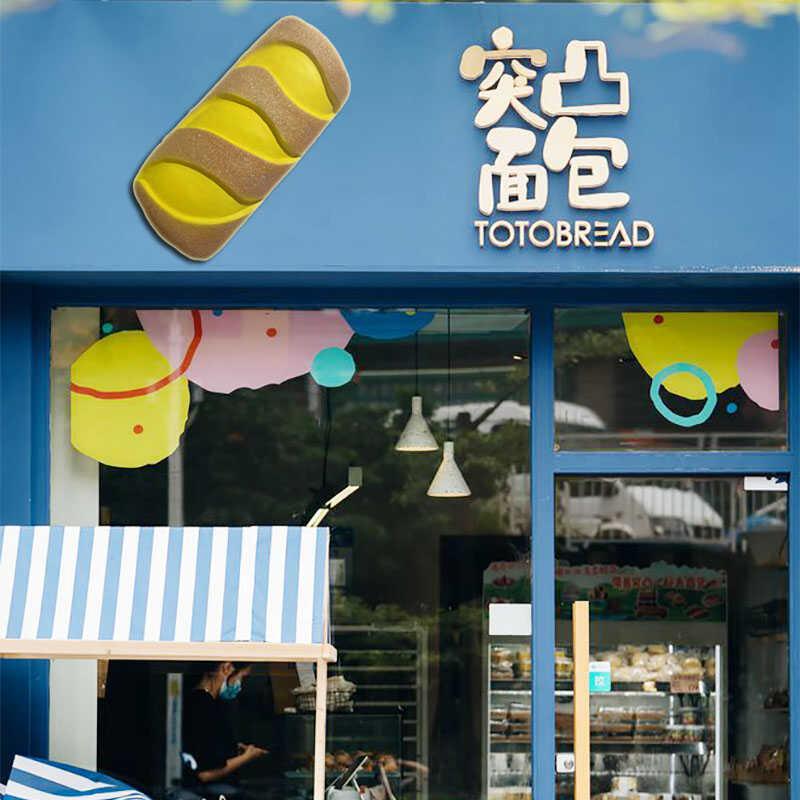 网红仿真卡通牛角法棍面包店铺门头装饰蛋糕店玻璃钢雕塑新款装饰