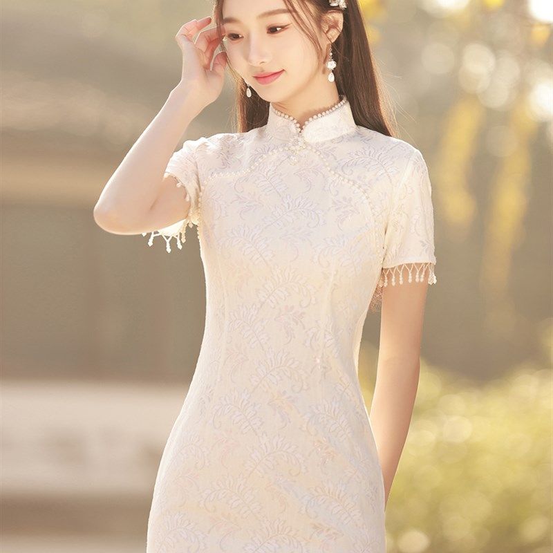 白色蕾丝旗袍20232023夏季年轻少女款复古国风订婚礼服连衣裙